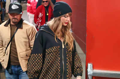 Taylor Swift stuns in black Louis Vuitton outfit worth $35,000 while supporting Travis Kelce at Chiefs-Bills AFC Championship