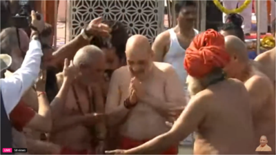 Amit Shah takes holy dip at Triveni Sangam in Prayagraj during Maha Kumbh visit