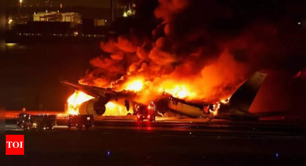 Plane with 176 on board catches fire at South Korean airport