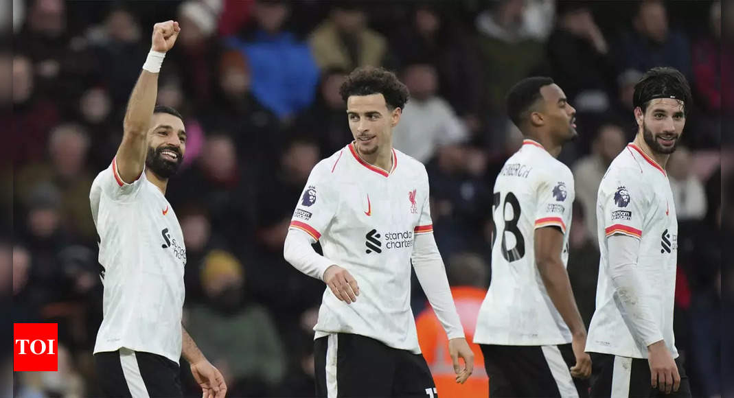 Mohamed Salah double fires Liverpool nine points clear