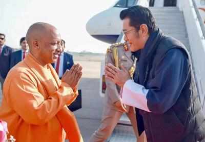 King of Bhutan takes dip at Sangam