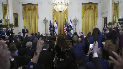 Trump's Gaza bombshell: Reporters push, shout and nearly climb over each other for answers