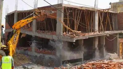 MC demolishes 8 illegal buildings constructed without sanctioned building plan
