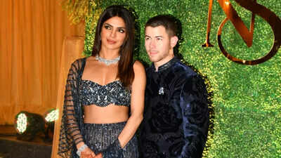 Priyanka Chopra patiently waits for Nick Jonas to finish his solo photo session, hugs Siddharth Chopra's fiancee Neelam Upadhyaya at sangeet night
