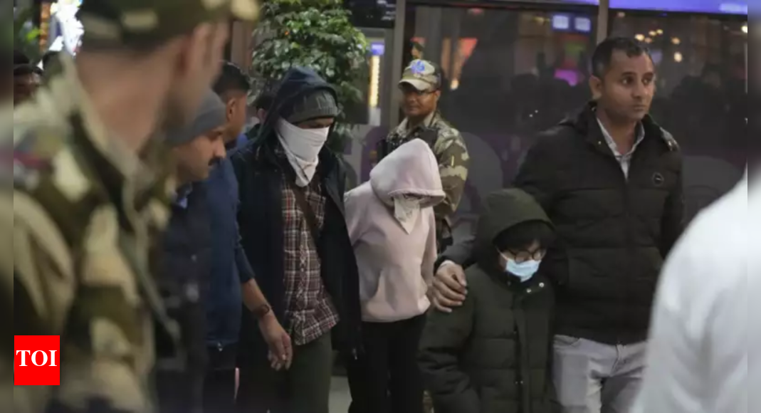 'We were handcuffed, had shackles on our legs during the 30-hour flight ...