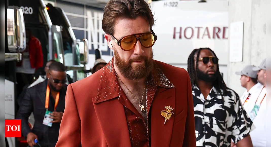 Travis Kelce’s fashion choice before Super Bowl LIX raises questions about whether it’s for a proposal or a nod to the 1970 Chiefs’ win