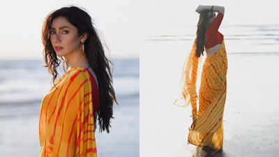 Who says you can’t wear a saree to the beach? Mahira Khan rocks the look in style!