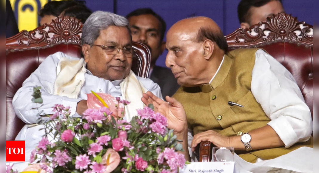 Rajnath Singh inaugurates Karnataka government event; Rahul, Kharge stay away