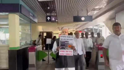 Congress workers protest against centre over increased metro fares in Bengaluru