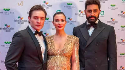 Amy Jackson flaunts her baby bump as she poses with Abhishek Bachchan and her husband Ed Westwick at British gala