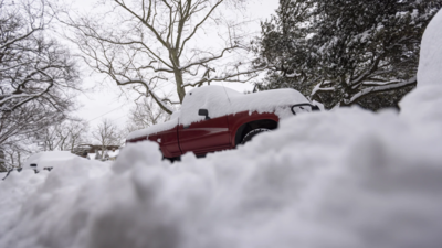 Snowy roads lead to hundreds of Virginia and North Carolina crashes as Arctic air brings record cold