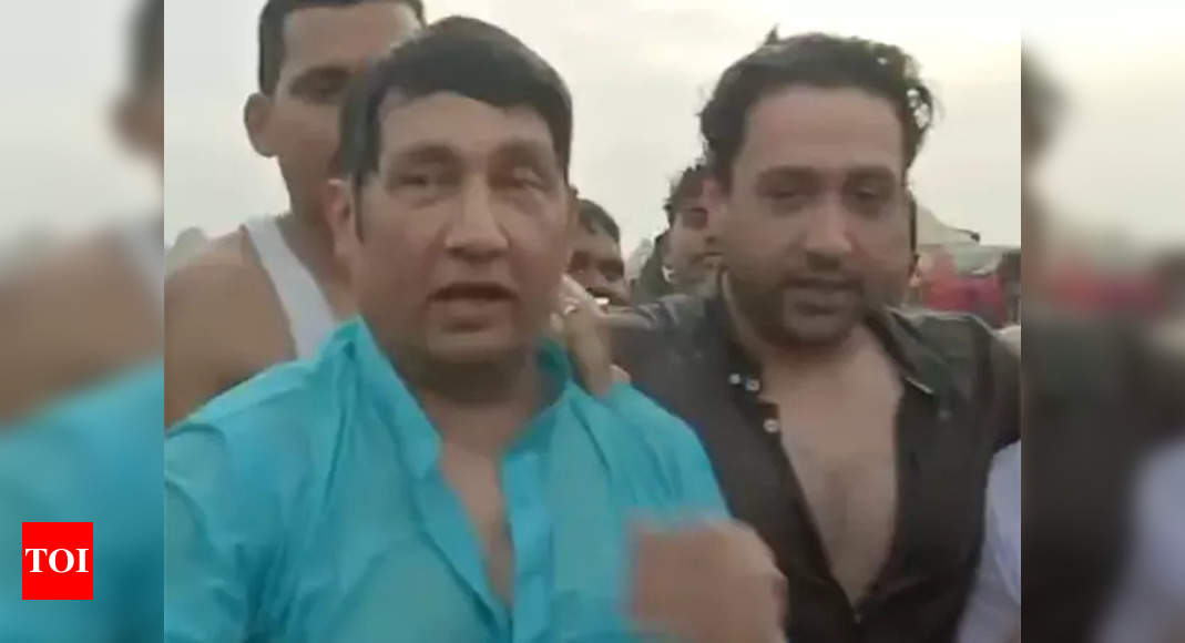 Shekhar Suman, son Adhyayan take holy dip at Maha Kumbh