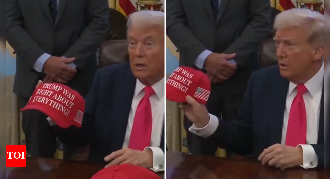 Watch: Donald Trump hands out ‘Trump was right about everything’ caps in the Oval Office