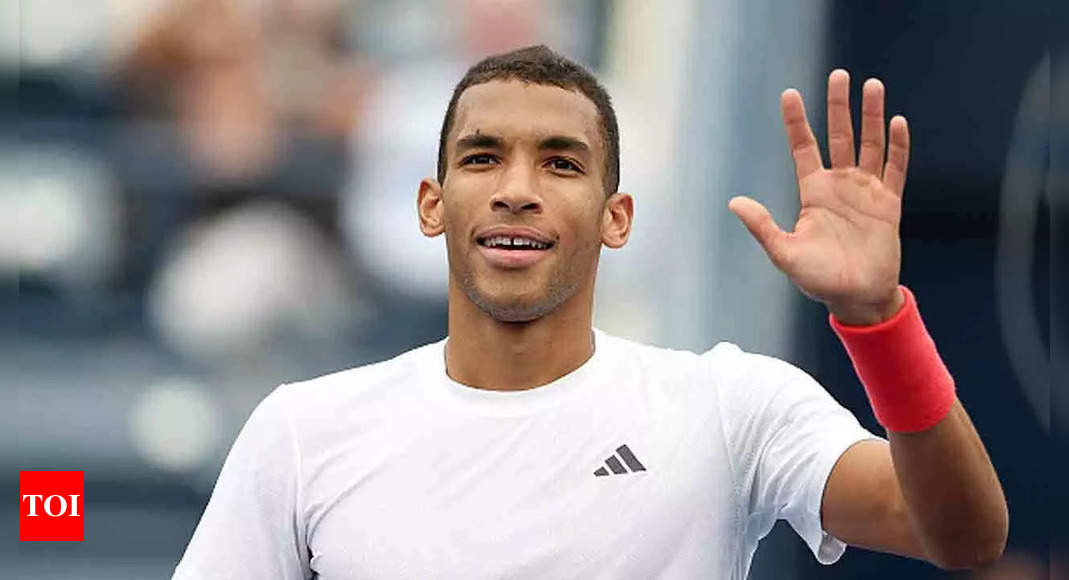 Auger-Aliassime vaults past Cilic