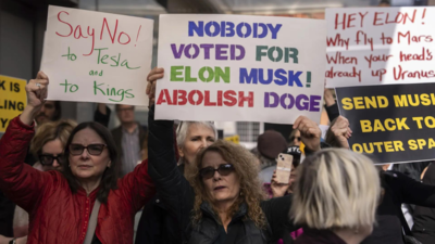 Anti-DOGE protests hit Tesla stores across US, call to boycott Elon Musk