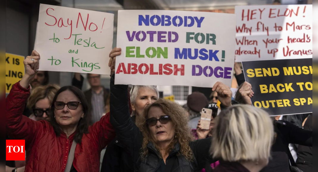 Anti-DOGE protests hit Tesla stores across US, call to boycott Elon Musk