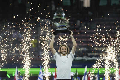 Stefanos Tsitsipas poses with the trophy after defeating Felix Auger-Aliassime in the finals of Dubai Duty Free Tennis Championship. (AP) Stefanos Tsitsipas ends ATP 500 finals losing streak with first title in Dubai