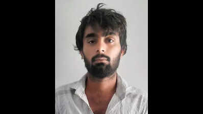 Man held in two-year-old robbery case