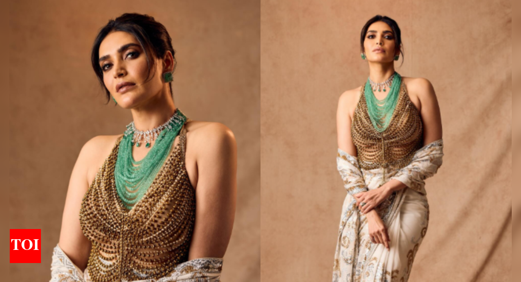 Karishma Tanna looks majestic in a gold and emerald ensemble