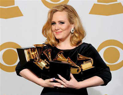 Adele plans career break