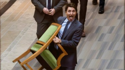 Trudeau takes his seat': Outgoing Canada PM's 'tongue out' Parliament exit  with chair in hand leaves netizens in splits - The Times of India