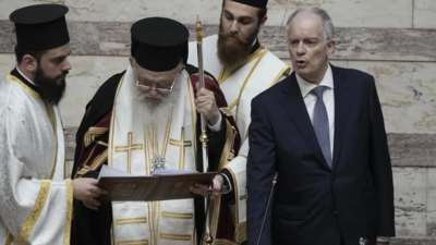 An experienced conservative MP is sworn in as the new President of Greece