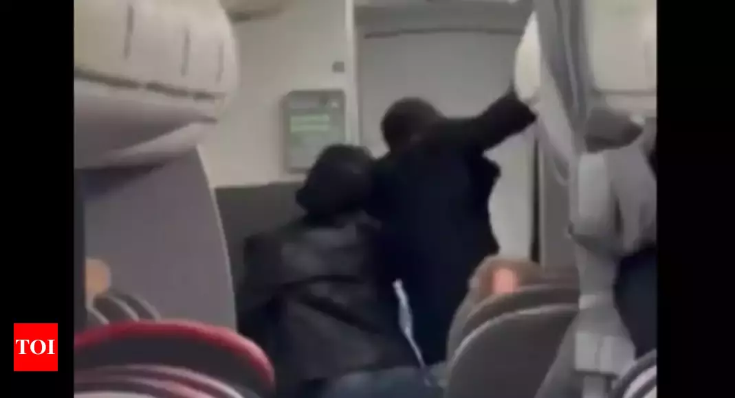 Watch: American Airlines passenger attacks crew, swallows rosary beads, says 'satan followed them on plane'