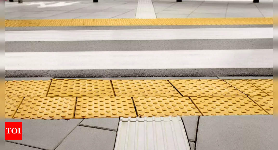 What do the yellow striped tiles on metro and railway stations mean?