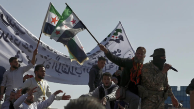 Syrians commemorate uprising anniversary for first time since Assad's fall