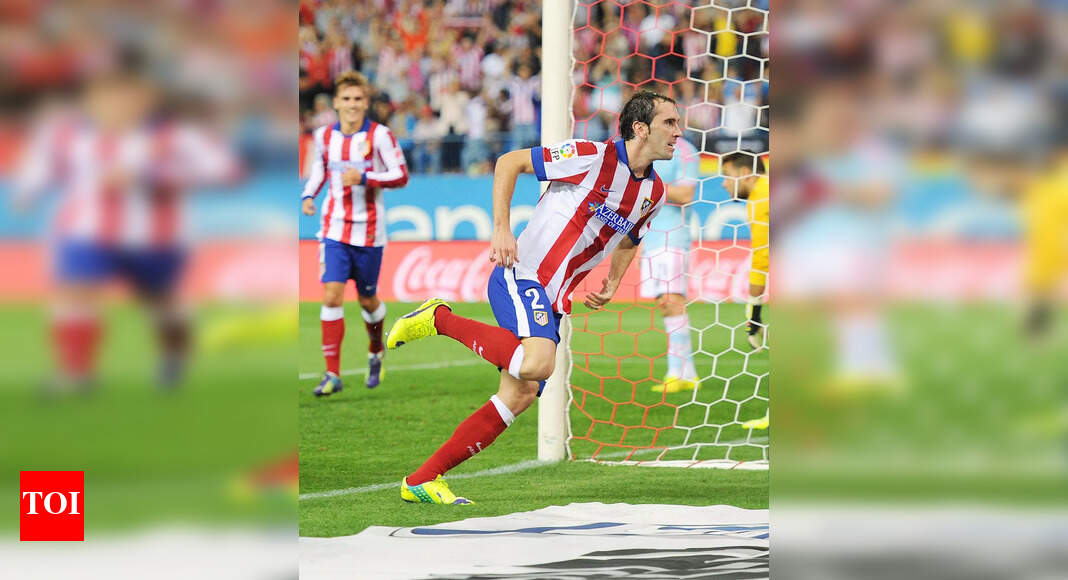 Diego Godin happy to see Atletico de Madrid on equal terms with Real and Barca