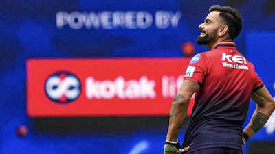 Virat Kohli gets roaring welcome, surprises fans with special gift – WATCH