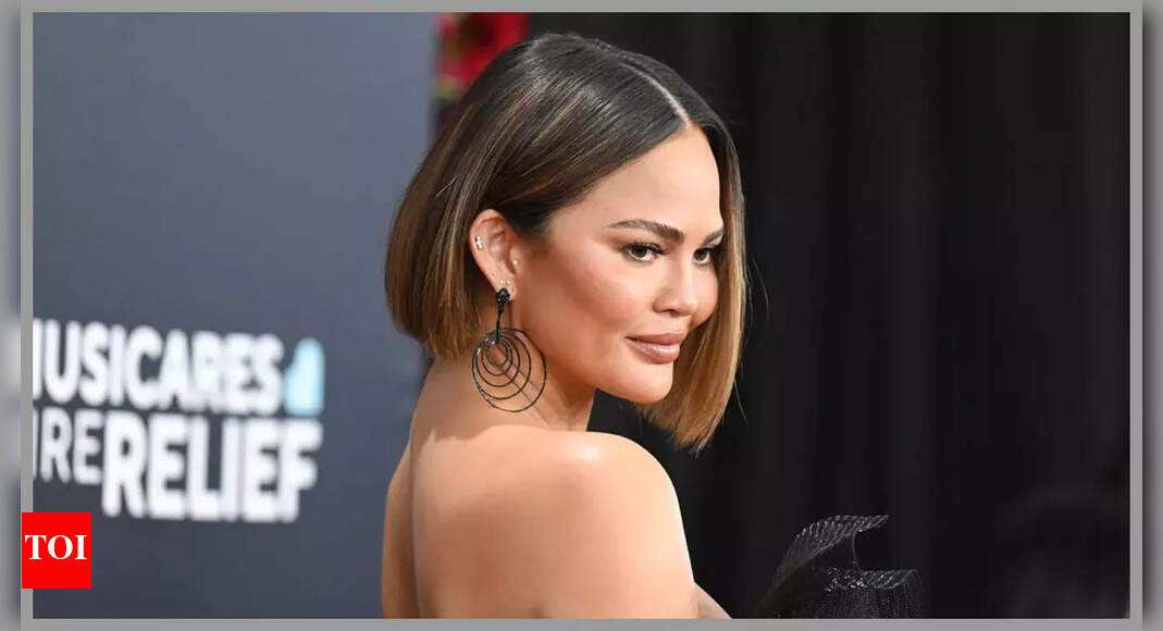 Chrissy Teigen claps back at trolls criticising her cheek fillers after backlash: 'Stop being miserable'