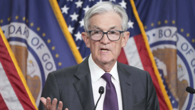 Federal reserve holds interest rates steady, signals two cuts this year amid economic uncertainty