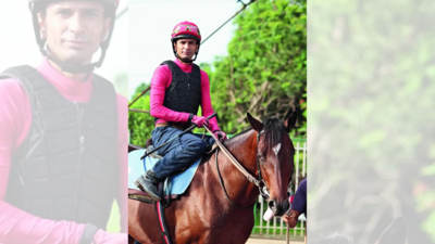 Jockey fights cancer, jumps back in saddle for 'sweetest race win'