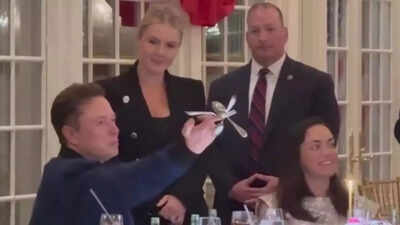 Elon Musk shows off 'balancing skill' at US President Donald Trump's  dinner, internet reacts - The Times of India