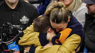 'Short king' energy: 5'5" wrestler wins big, celebrates even bigger with his 6'2" girlfriend
