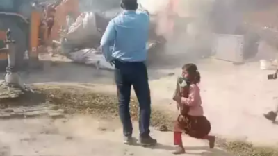 'I want to be an IAS': 7-year-old UP girl saves schoolbooks during bulldozer action