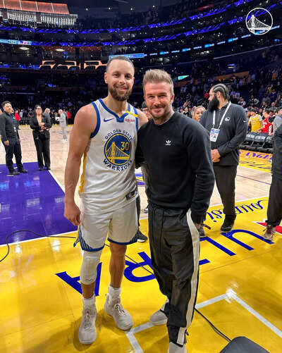 Golden State Warriors star Stephen Curry gifts his jersey to David Beckham after win against the Los Angeles Lakers