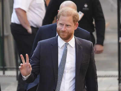 Prince Harry and Meghan Markle felt they were 'forced to step back’ from royal duties, his lawyer tells UK court