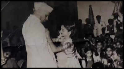 When young Sharmila Tagore pinned a rose on former Indian PM Jawaharlal Nehru's jacket