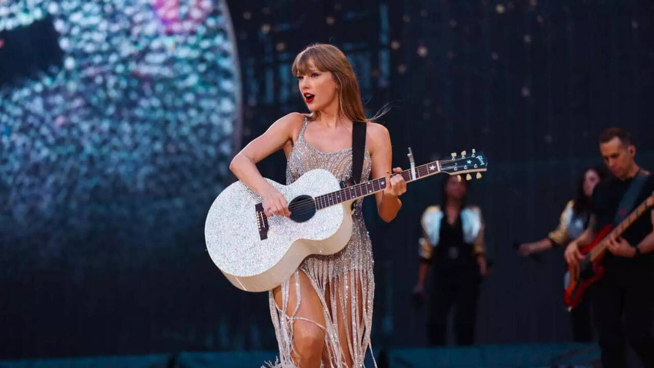 silver noodle dress Taylor Swift's iconic 'silver noodle dress' steals spotlight at Country  Music Hall of Fame in Nashville | NFL News