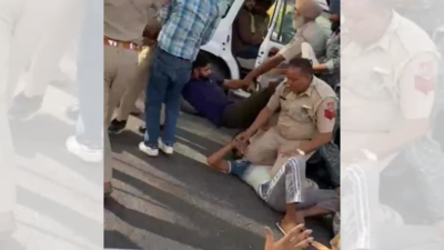 Floyd moment redux: Punjab cop resting knee on protesting teacher’s chest sparks row