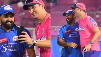 Rohit Sharma and Shane Bond (Screengrabs) 'I just gave my bat': Rohit Sharma's post-match chatter with Shane Bond goes viral - Watch