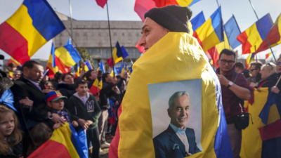 Romanians return to polls as far right hopes to win presidential rerun