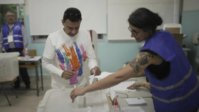 Battered by war and economic crisis, Lebanon holds first local elections in almost 10 years