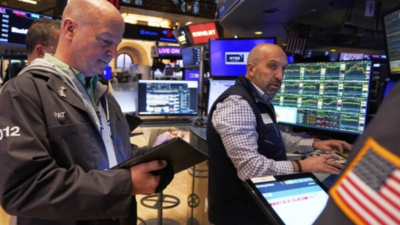 Wall Street slips as oil falls, Dow drops 100 points, S