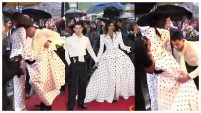  Nick 'Jiju' takes over the internet once again as he helps wifey Priyanka Chopra with her dress on the red carpet