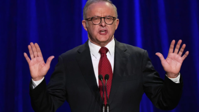 Australia government to continue working on cutting net migration, hiking minimum pay for skilled workers