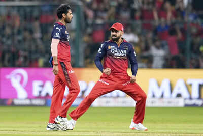Royal Challengers Bengaluru's Bhuvneshwar Kumar, left, celebrates with teammate Virat Kohli (AP Photo) Bhuvneshwar Kumar makes huge claim, credits Virat Kohli for India's Test transformation