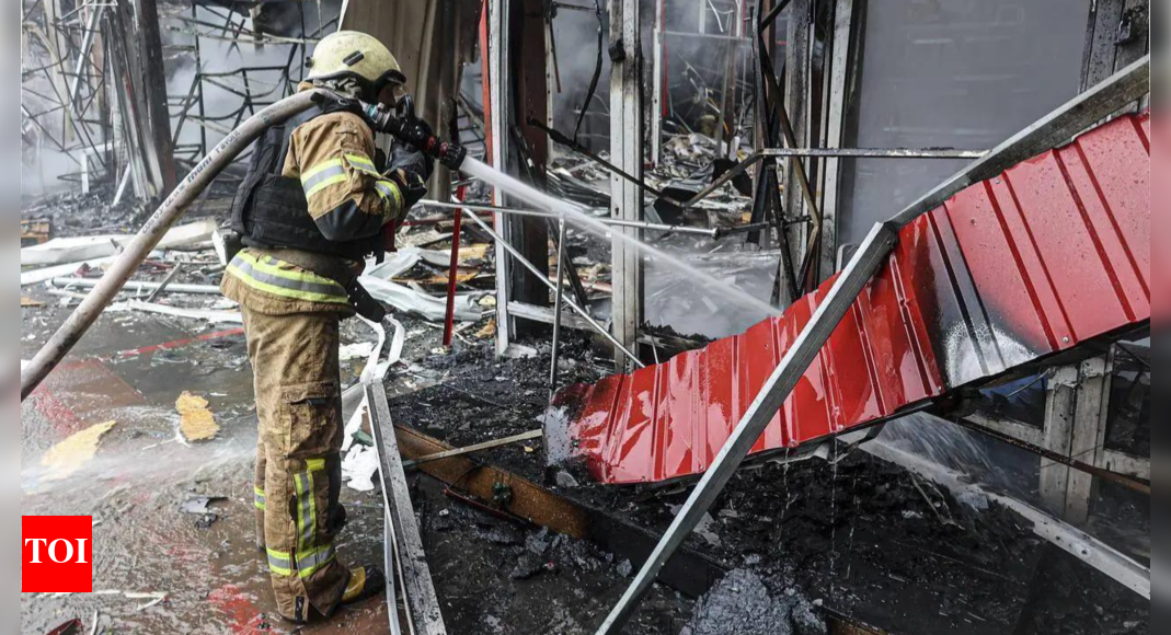A Russian missile-and-drones attack kills 2 people in Ukraine's capital